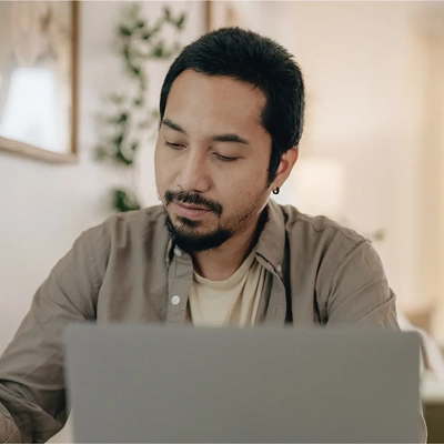 box-guy-working-on-computer