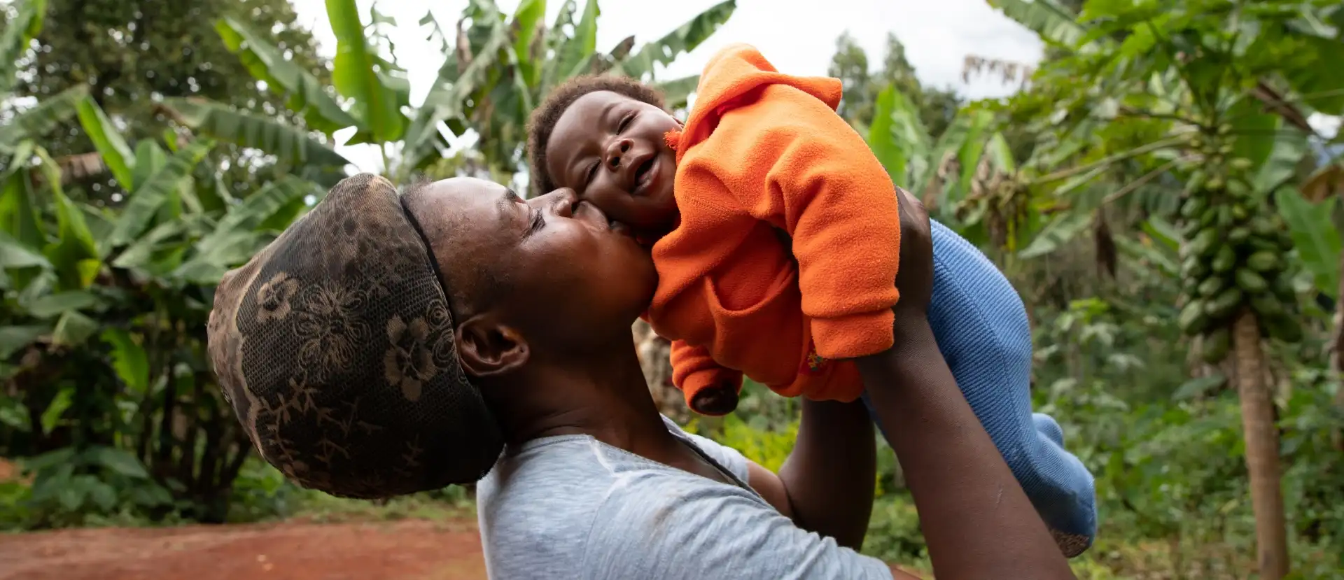 woman-kissing-her-baby