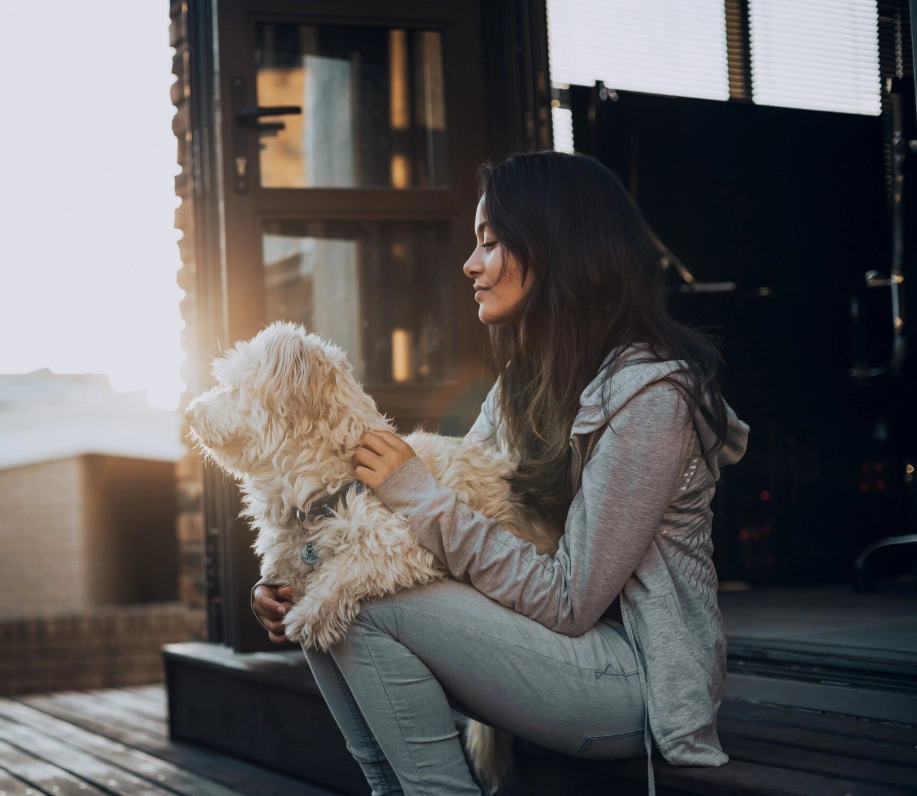 woman-with-dog-home